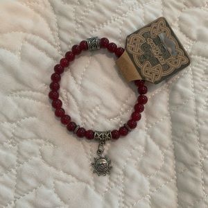 Red charm bracelet